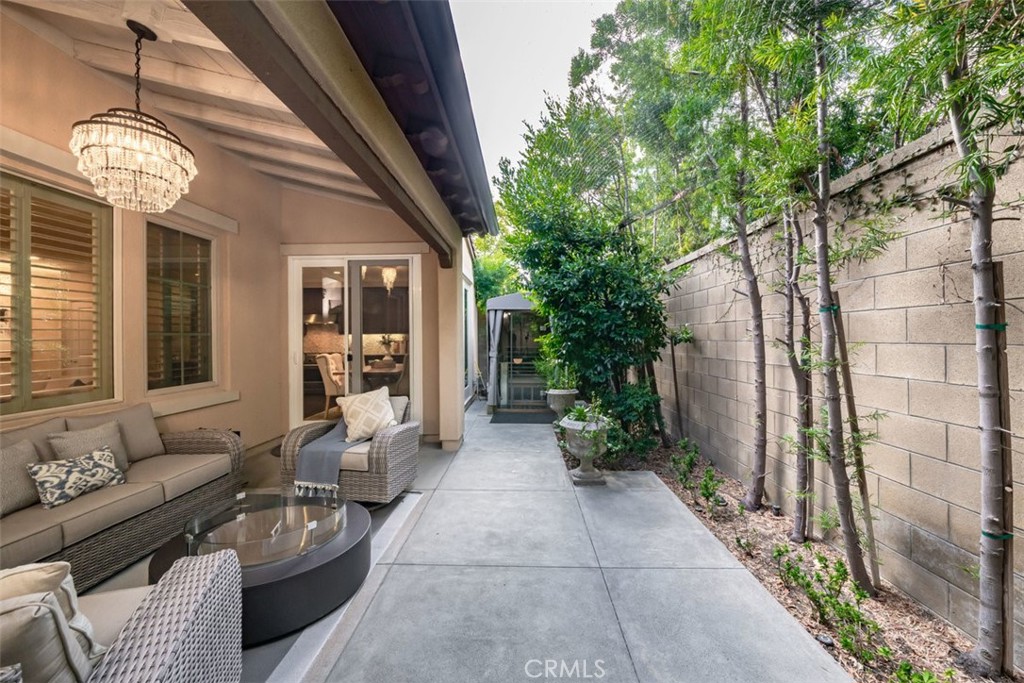 43 Lupari Irvine, CA 92618 - Photo 62 of 68 a living room with furniture and a chandelier