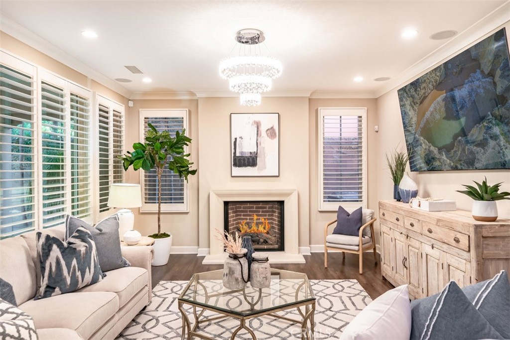 43 Lupari Irvine, CA 92618 - Photo 7 of 68 a living room with furniture fireplace and window