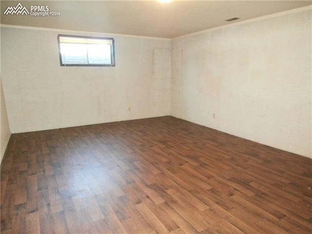 2870 Valencia Road Colorado Springs, CO 80917 - Photo 17 of 20 Another large room in basement for more entertaining possiblities