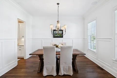 a living room with furniture fireplace and a flat screen tv
