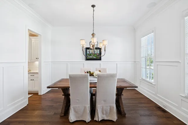 a living room with furniture fireplace and a flat screen tv