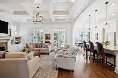 a kitchen with stainless steel appliances granite countertop a sink and a stove
