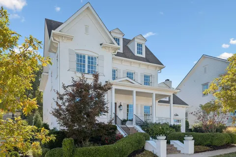 a view of two chairs in balcony