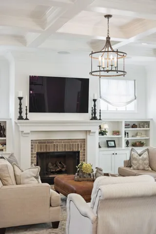 a bedroom with a bed and flat screen tv