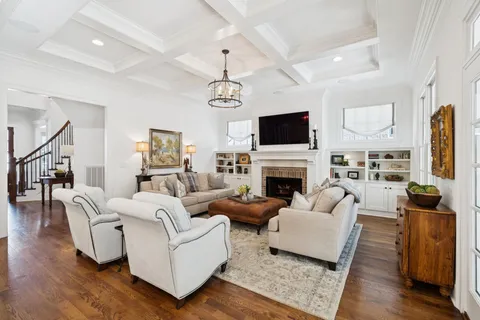 a bath tub sitting next to a white sink