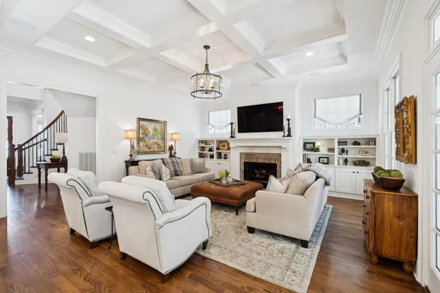 a bath tub sitting next to a white sink