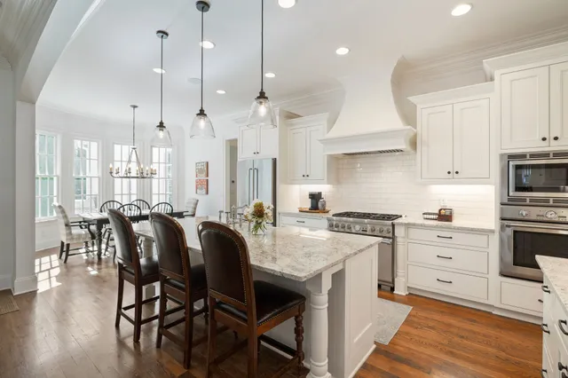 a view of a chair and table on the deck