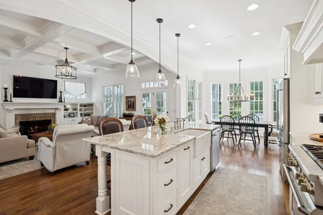 a front view of a house with outdoor seating