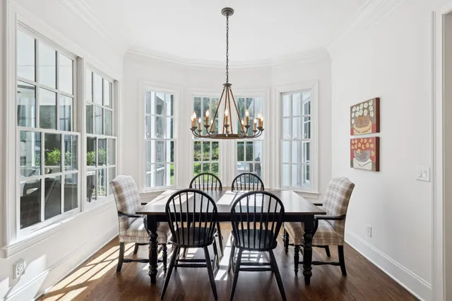 a front view of a house with a yard outdoor seating and barbeque oven