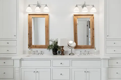 an aerial view of a house with a yard basket ball court and outdoor seating