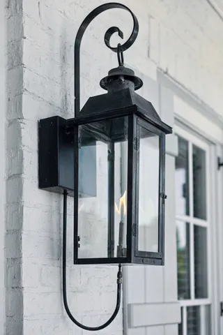 a view of a room with wooden floor table and chairs