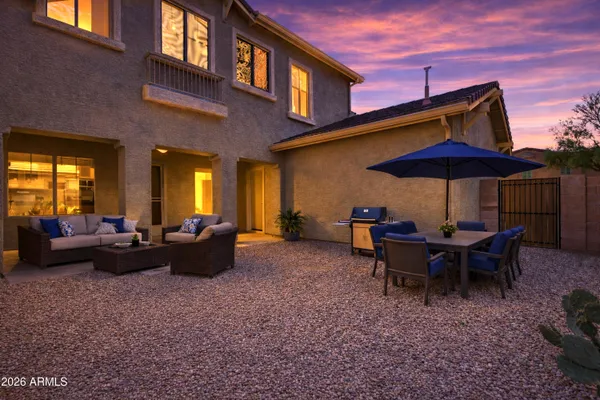 a view of a tables and chairs in patio