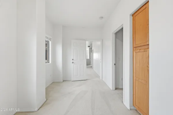 a view of a room with a wardrobe space
