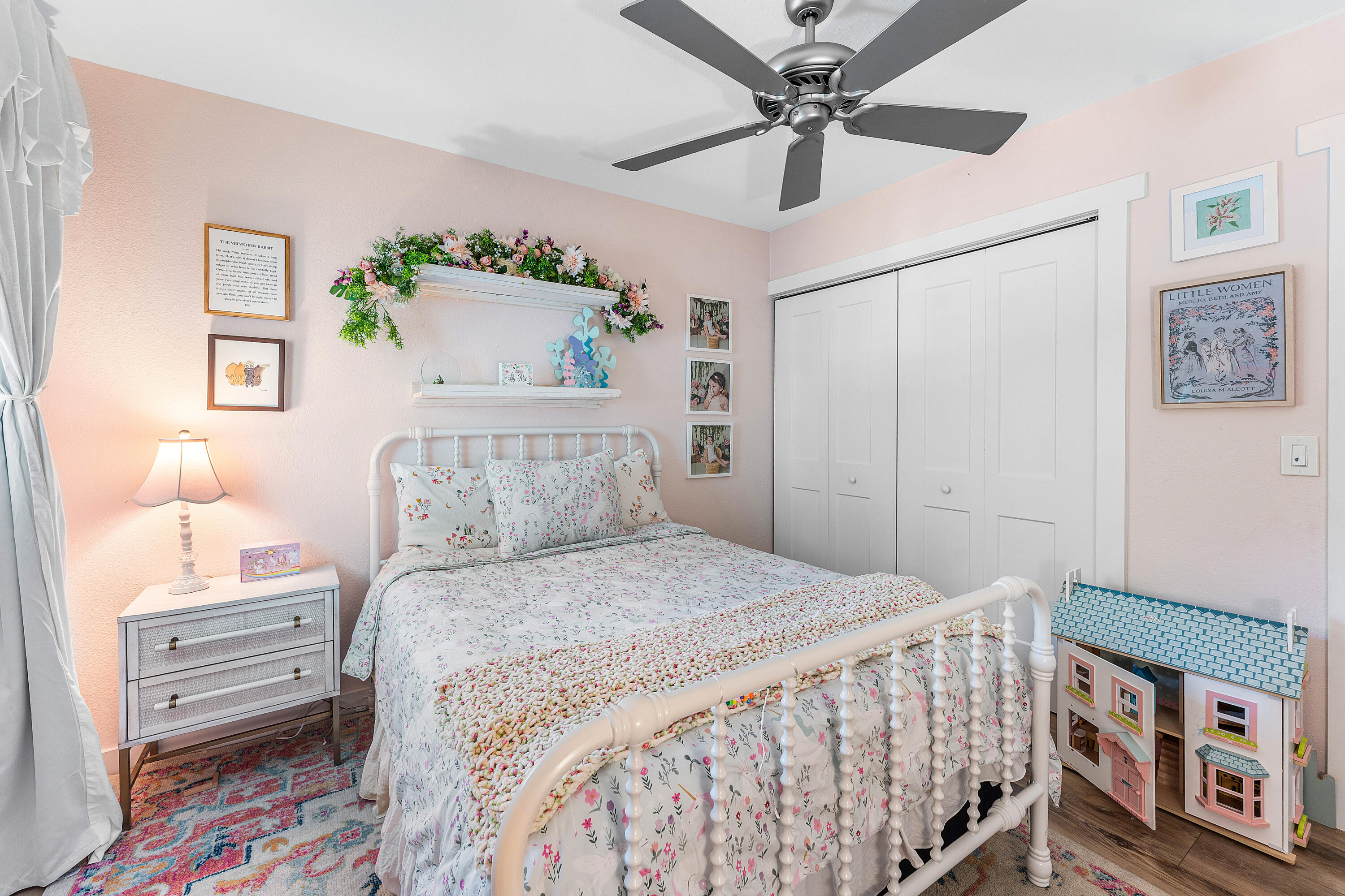 514 Dover Road Tequesta, FL 33469 - Photo 23 of 37 a bedroom with a bed and a chandelier
