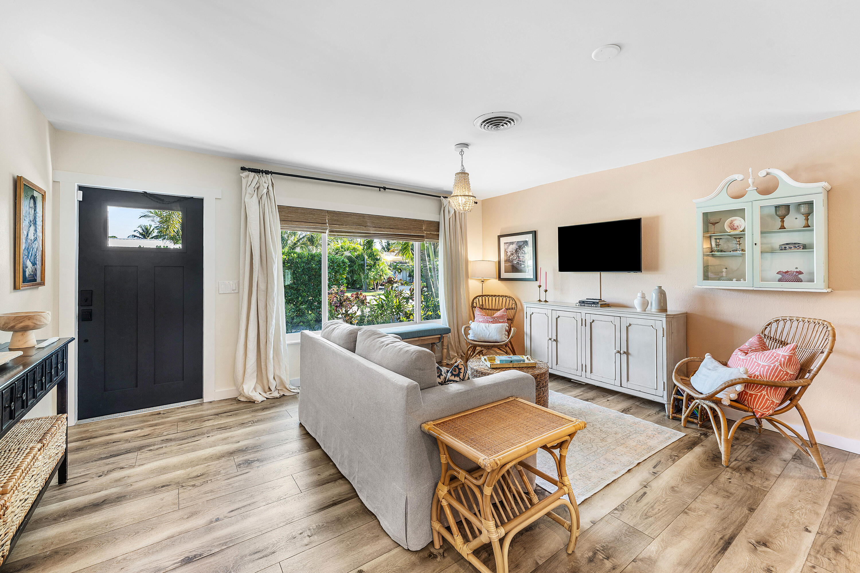 514 Dover Road Tequesta, FL 33469 - Photo 5 of 37 a living room with furniture and a flat screen tv