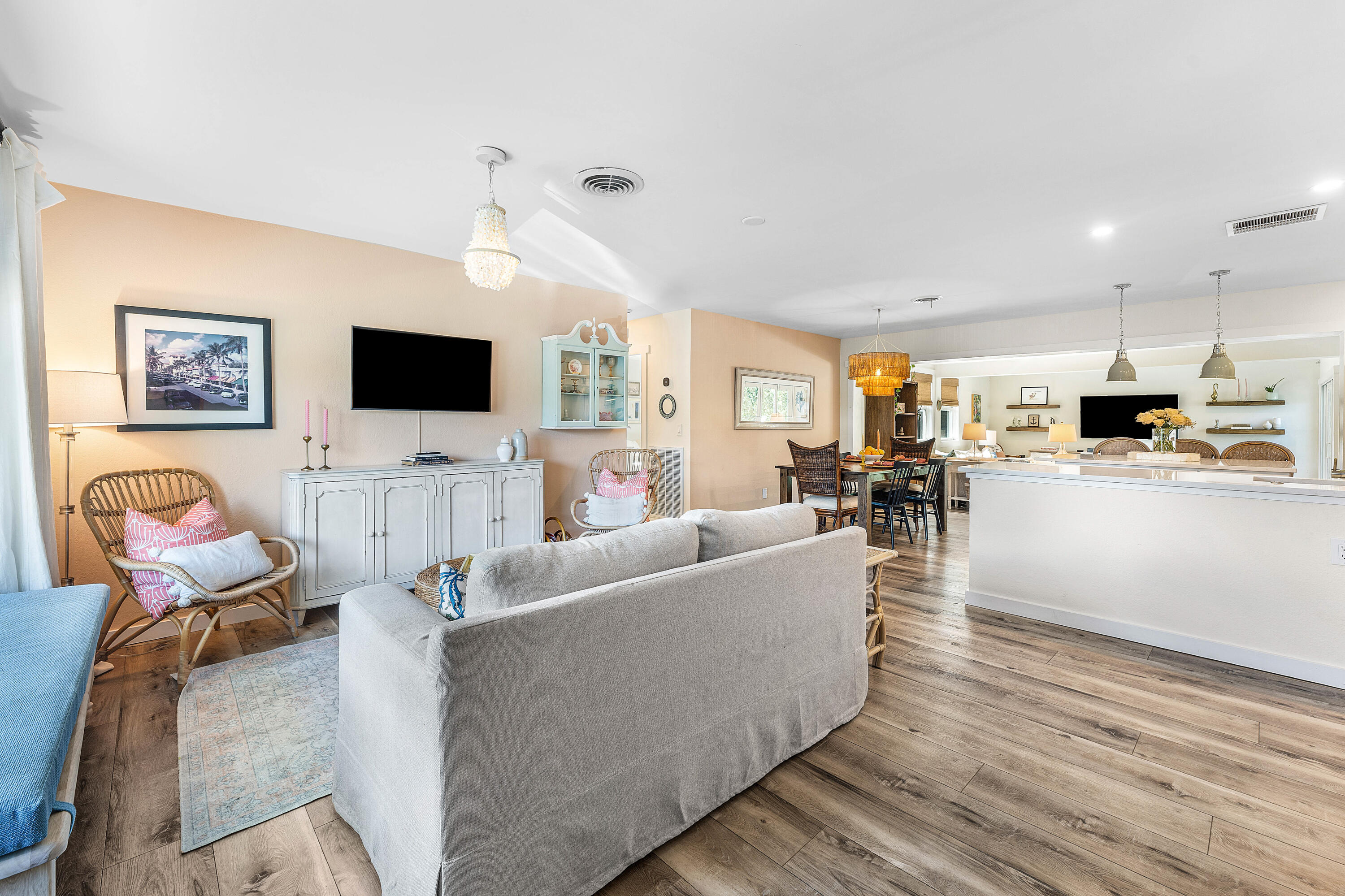 514 Dover Road Tequesta, FL 33469 - Photo 6 of 37 a living room with furniture and a flat screen tv