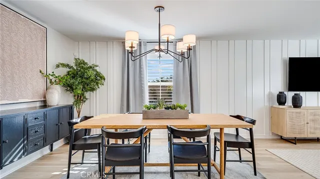 a view of a dining room with furniture and window