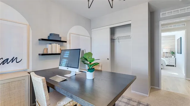 a view of kitchen island with furniture and wooden floor