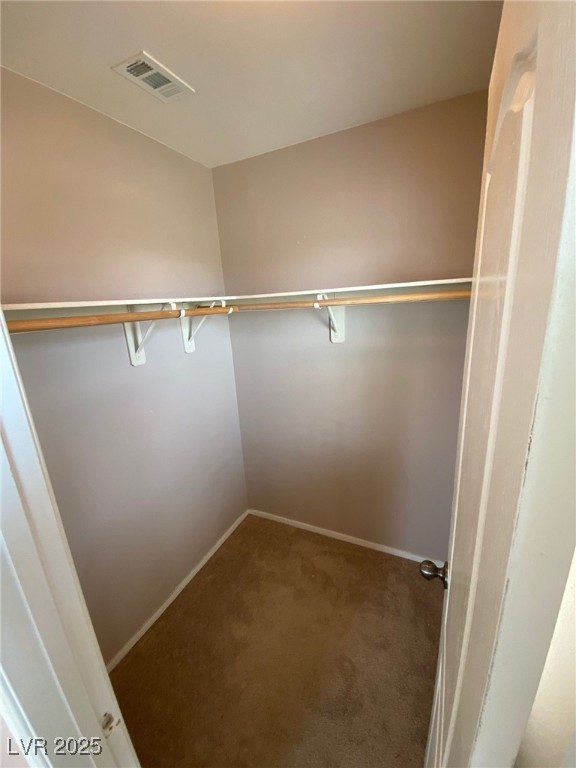 5817 Addy Lane, Unit N North Las Vegas, NV 89081 - Photo 19 of 32 Spacious closet featuring carpet