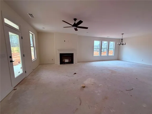 a view of swimming pool with outdoor seating and mountain view