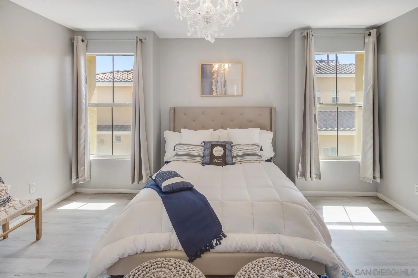 2252 Huntington Point Road, Unit 87 Chula Vista, CA 91914 - Photo 9 of 26 a bedroom with a large bed and a window
