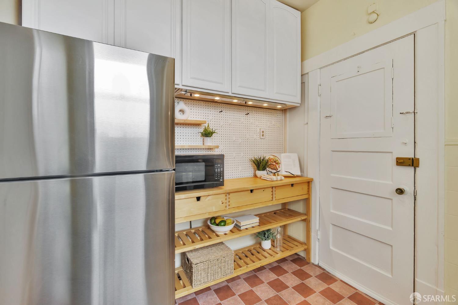 1180 Jackson Street, Unit 6 San Francisco, CA 94109 - Photo 12 of 48 a room with storage and utility