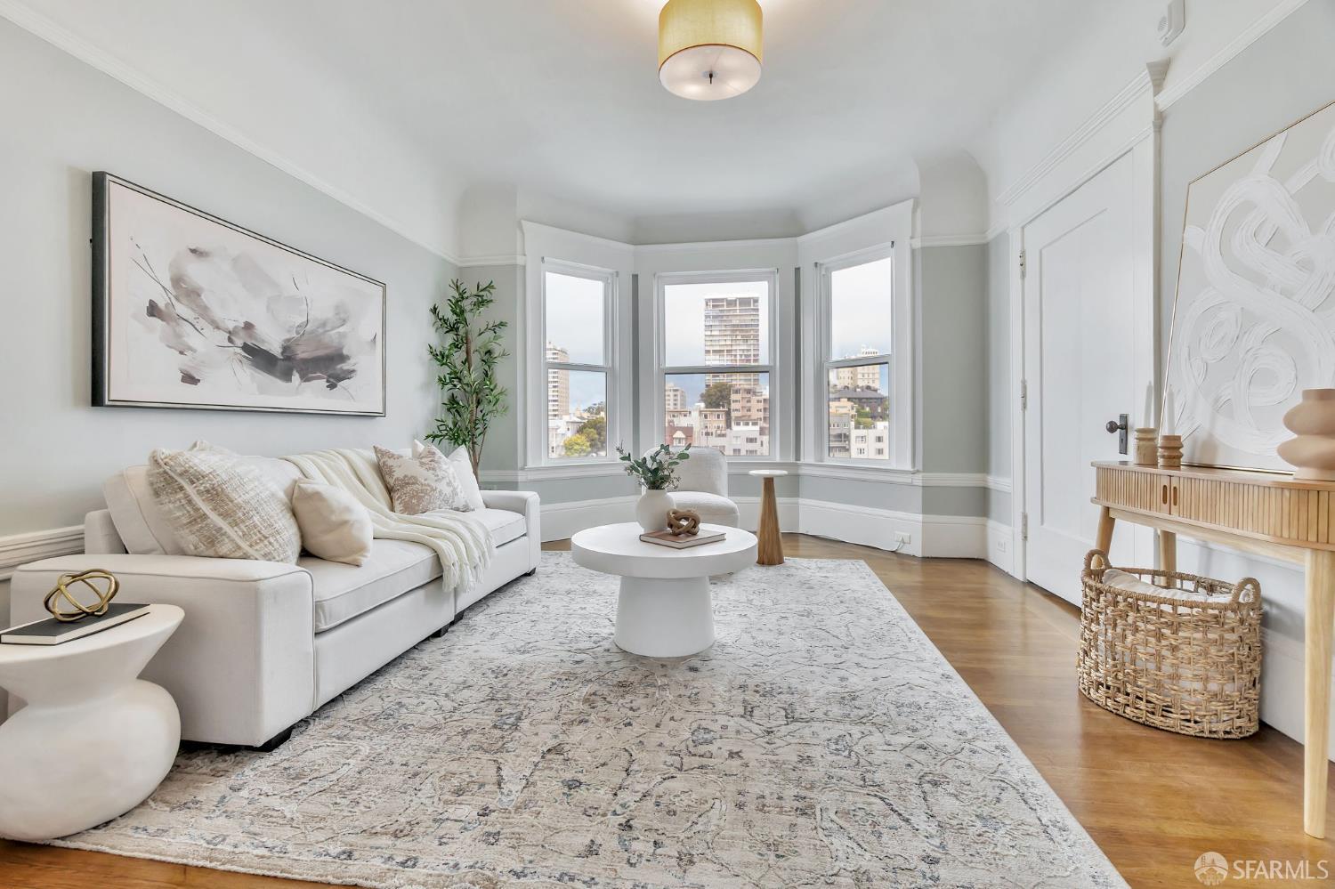 1180 Jackson Street, Unit 6 San Francisco, CA 94109 - Photo 2 of 48 a living room with furniture and a large window