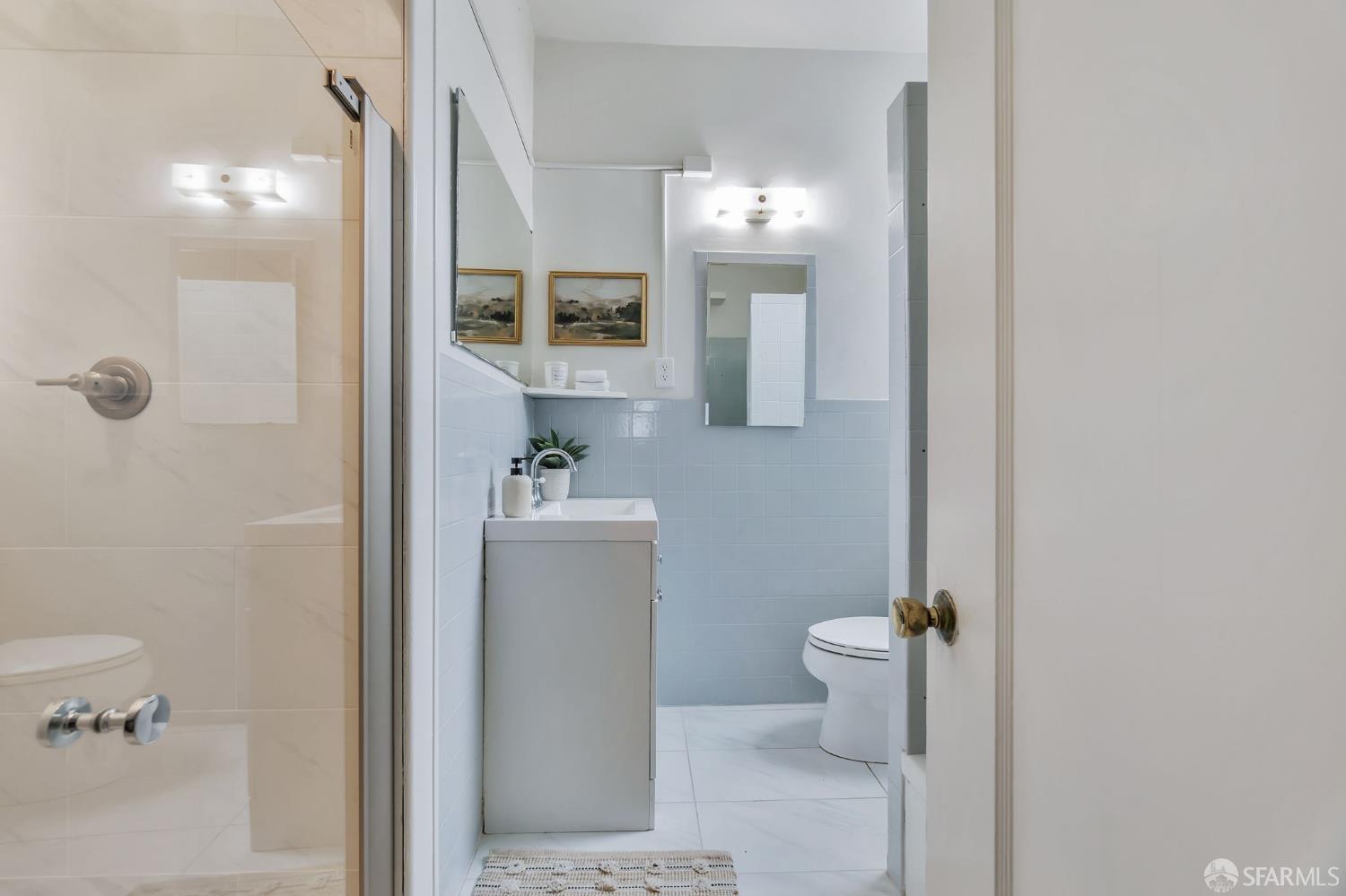 1180 Jackson Street, Unit 6 San Francisco, CA 94109 - Photo 24 of 48 a bathroom with a sink and toilet