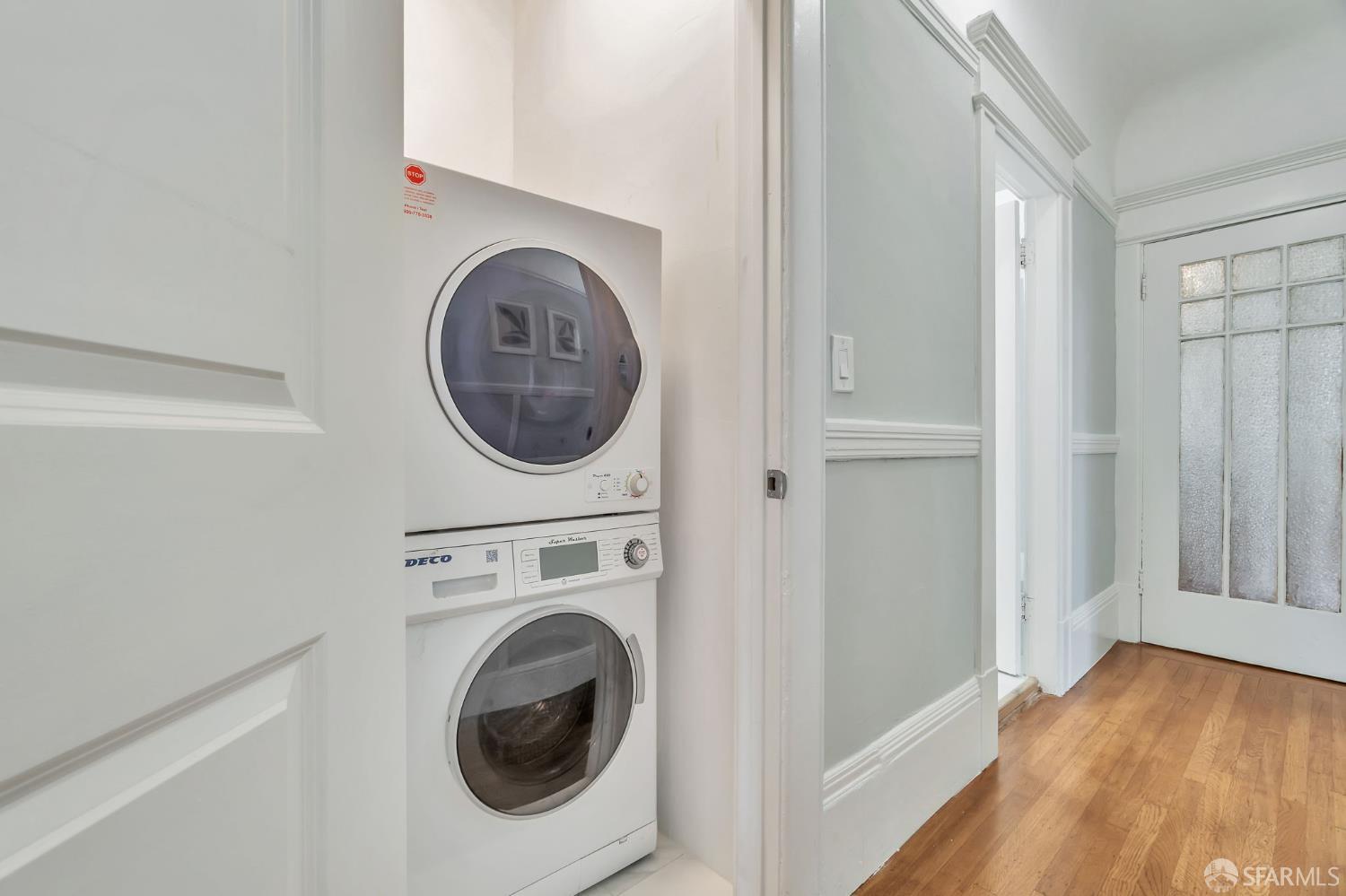 1180 Jackson Street, Unit 6 San Francisco, CA 94109 - Photo 27 of 48 a utility room with dryer and washer