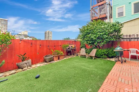 a view of a street with a building in the background