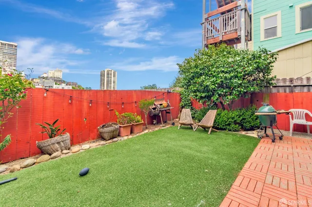 a view of a street with a building in the background