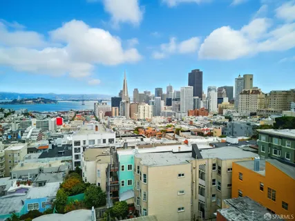 a view of a city with tall buildings