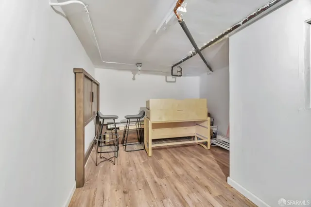 a view of ocean with a multi story building