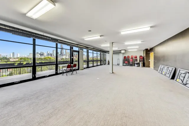a view of balcony with wooden floor