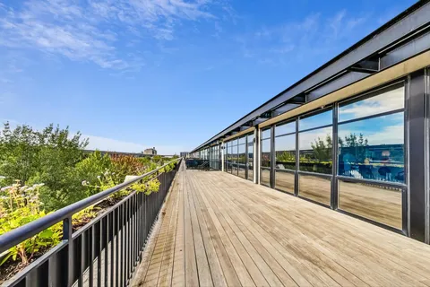 a view of a terrace with seating area