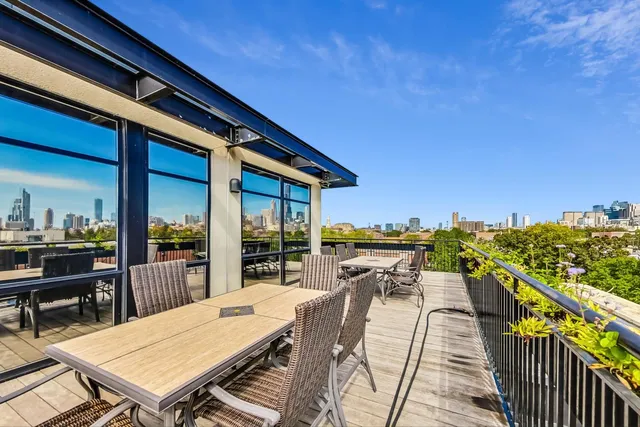 a view of a balcony with city view