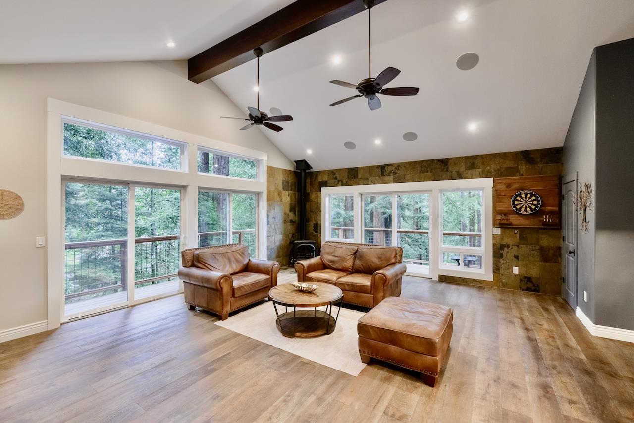 295 Jim's Road Ben Lomond, CA 95005 - Photo 32 of 139 a living room with furniture and a large window