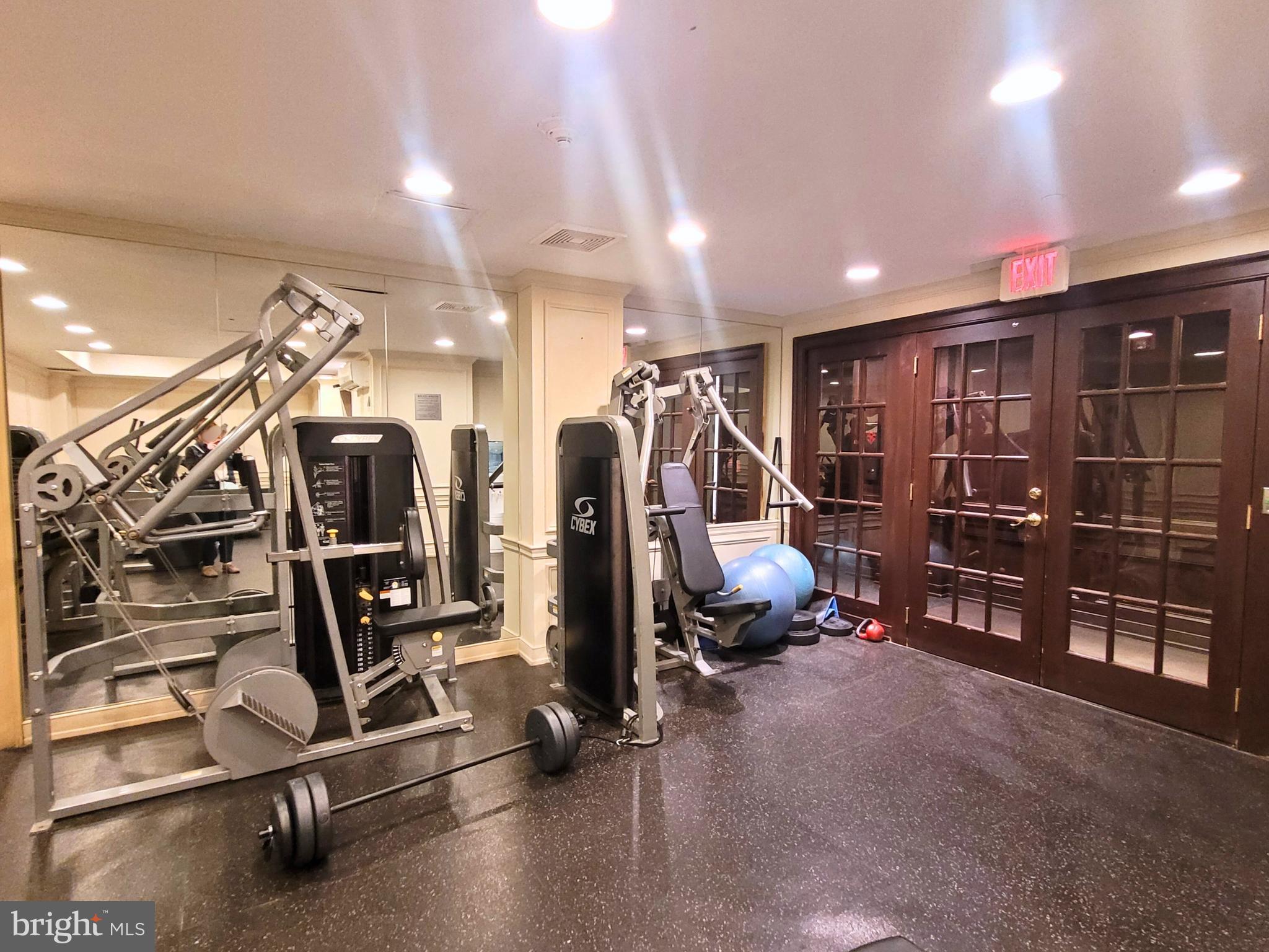 2031 Locust Street, Unit 1005 Philadelphia, PA 19103 - Photo 13 of 15 a view of a room with gym equipment