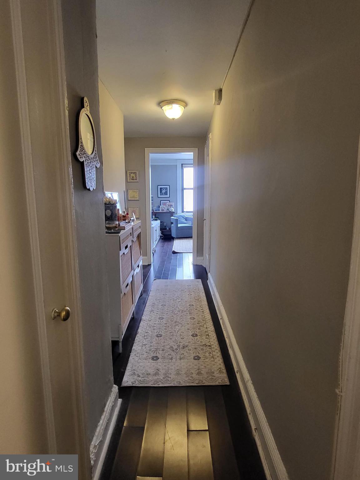 2031 Locust Street, Unit 1005 Philadelphia, PA 19103 - Photo 2 of 15 a view of hallway with wooden floor