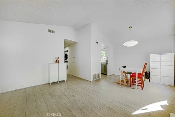 a view of a room with furniture and bicycles