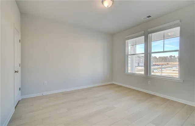 an empty room with a window