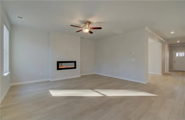 a view of a big room with carpet