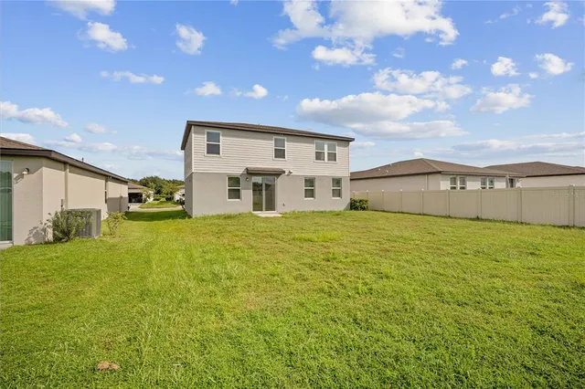 a big room with table and chairs