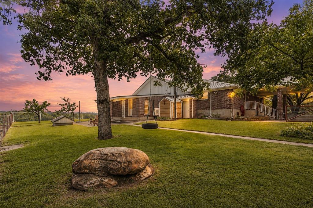 339 Colwell Road Forestburg, TX 76239 - Photo 1 of 31 Sunset view of the beautiful backyard of 339 Colwell Rd in Forestburg, TX