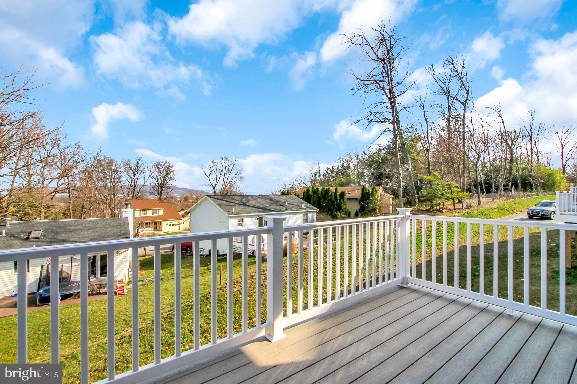 51 Overlook Dr., Unit J Hanover, PA 17331 - Photo 13 of 13 a view of a houses with a trees from a balcony