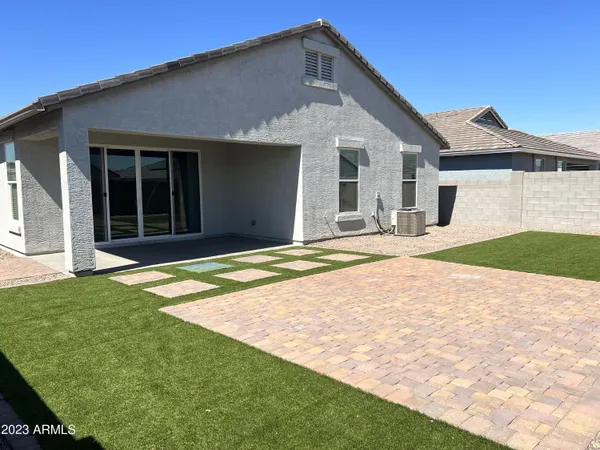 a house with yard in front of it