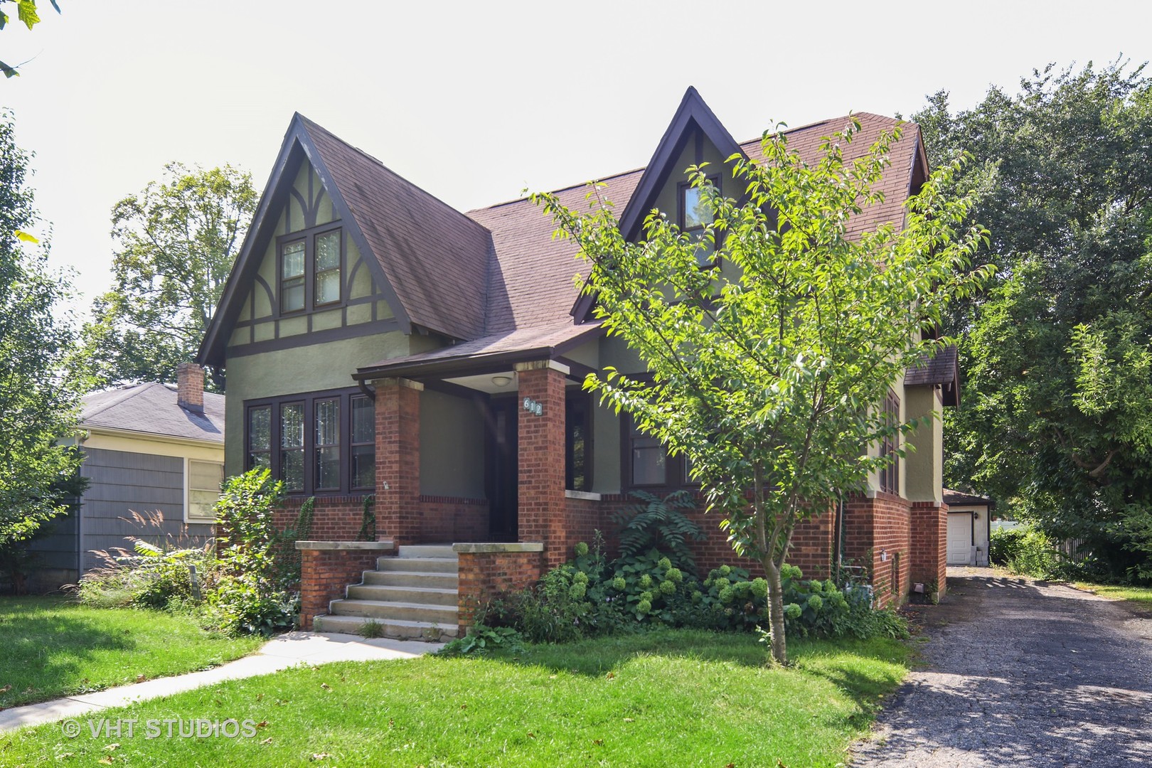 612 Spring Road Elmhurst, IL 60126 - Photo 18 of 19 a view of a house with a yard and plants