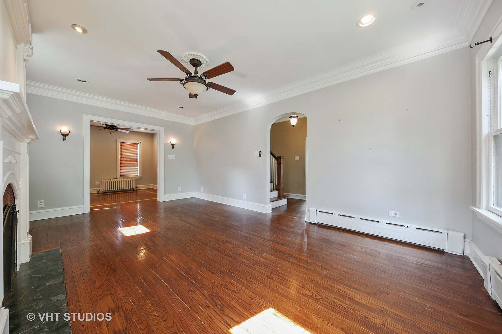 612 Spring Road Elmhurst, IL 60126 - Photo 7 of 19 wooden floor in an empty room with a window