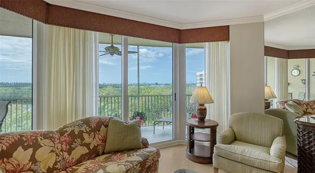 a kitchen with granite countertop cabinets and refrigerator