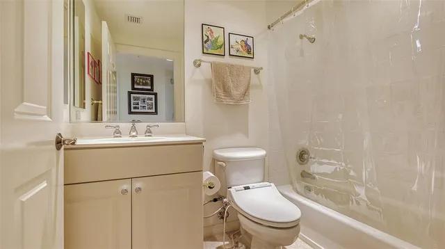 front view of a house with a garden